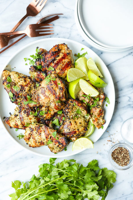 Cilantro Lime Chicken Thighs—Truly the most AMAZING zesty cilantro-lime marinade ever! The chicken comes out perfectly juicy and so tender.