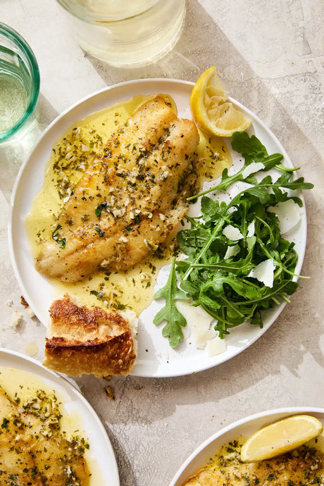 Tender, juicy, flaky fish with a lemon-garlic sauce that will knock your socks off. A 20 minute dinner recipe – so fast, so easy, so good!