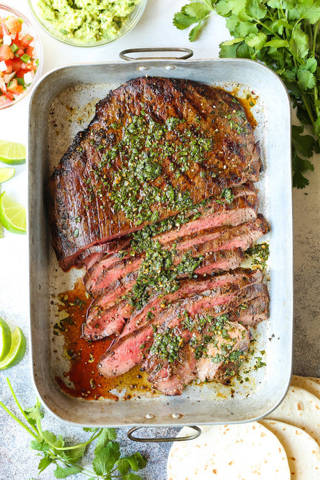 Cilantro, olive oil, soy sauce, orange + lime juice, garlic, jalapeno and cumin make for the easiest and most flavorful marinade. SO SO GOOD.